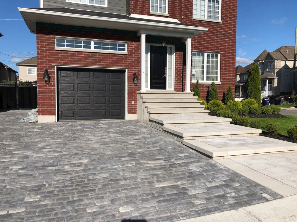 Enhance Montreal home curb appeal with Bucaro Landscaping's paving stone driveways and interlocking paving solutions. Durable and stylish, ideal for driveways, walkways, and patios.